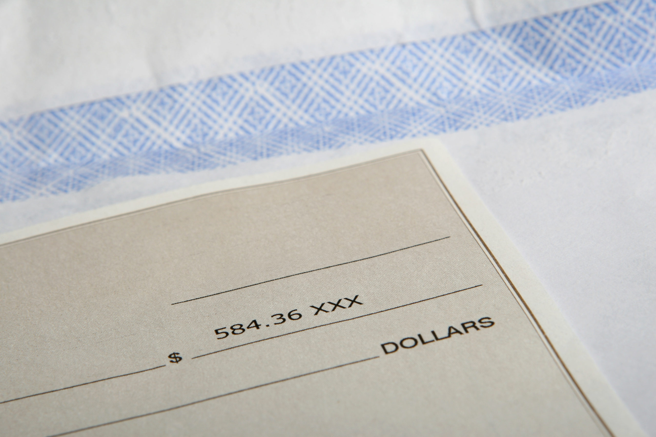 close up shot of corner of check for $584.36