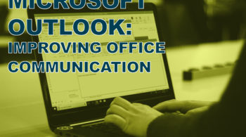 man on computer using outlook